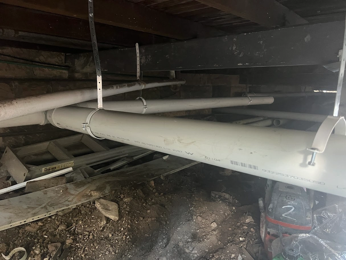 Emergency plumber from Sigma Plumbing repairing a burst water pipe at a home in Western Sydney